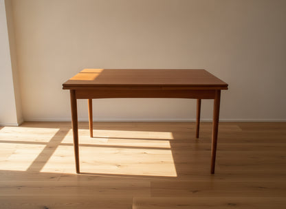 brugte-teak-spisebord-med-hollandske-udtræk